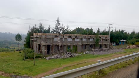 unfinished building at construction site seen from the road in narok, kenya