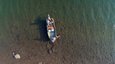 tourists fishing on a boat in river 4k