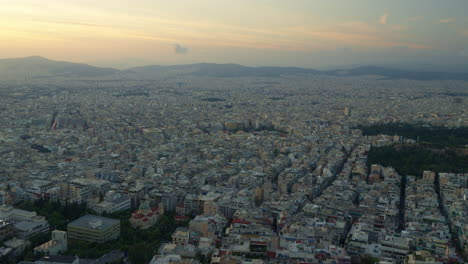 sunset hues over athens with a silhouette of acropolis