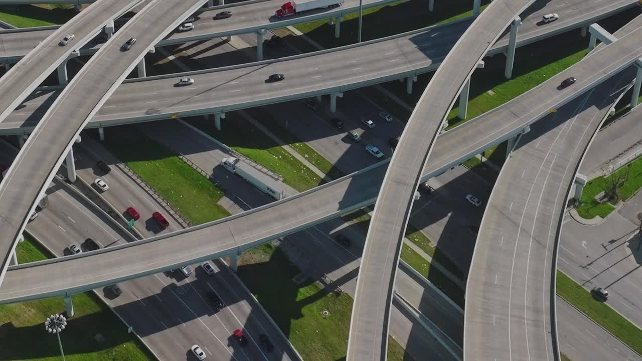 Traffic flows on highways in downtown Dallas, Texas during daylight