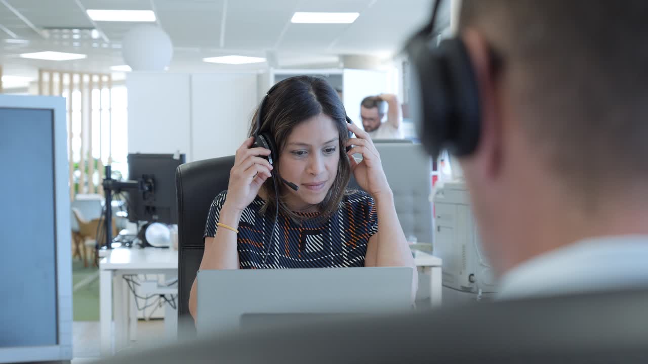 Woman working and communicating in a modern office setting