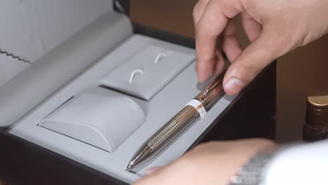 saudi man wearing a pen to be more elegant