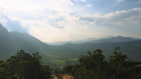 aerial drone shot of the tranquil beauty of munnar’s hills covered in lush tea plantations