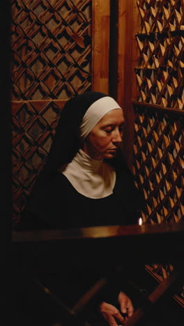 nun in prayer