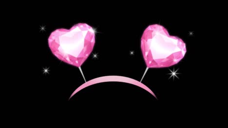 animación forma de corazones rosados flotando sobre un fondo negro.