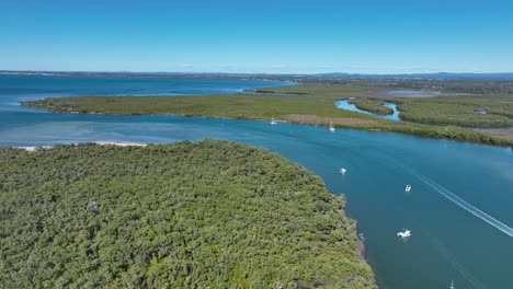 aerial drone shot flying over beachmere boat ramps on caboolture river