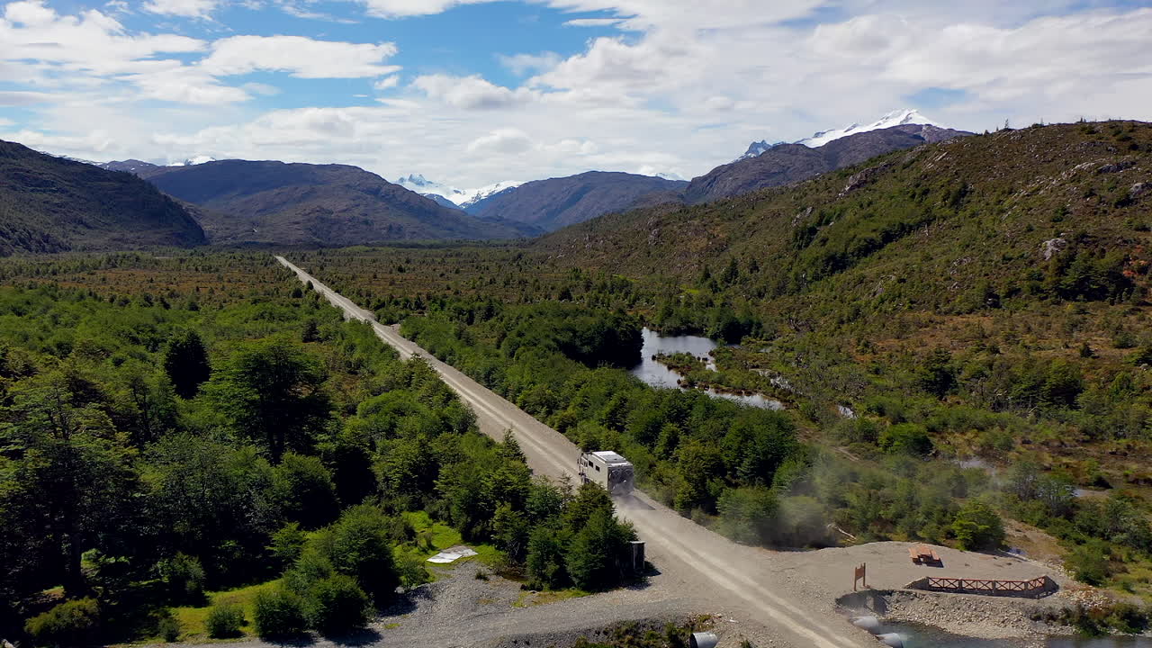 Tracking Expedition Truck Overlander Bridge Dusty Carretera Australe Snowy Mountains Luxurious Vegetation Patagonia Chile Villa O'higgins
