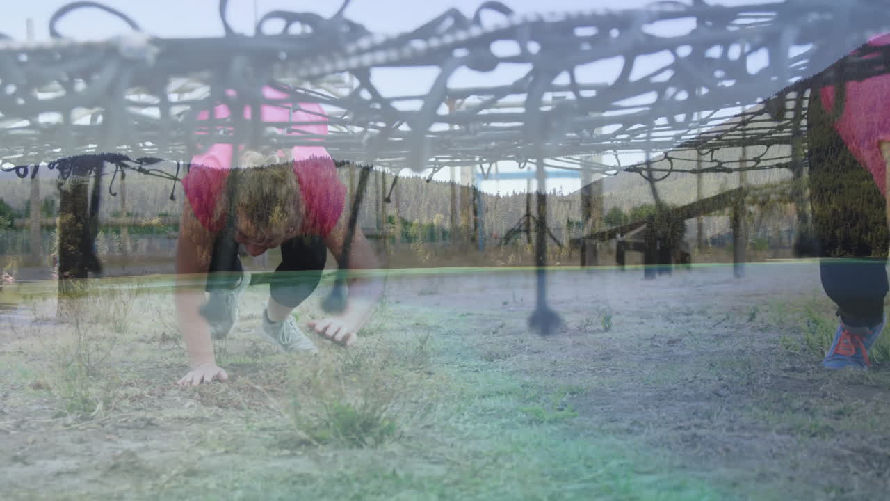 Crawling under netting, person tackling outdoor obstacle course challenge animation