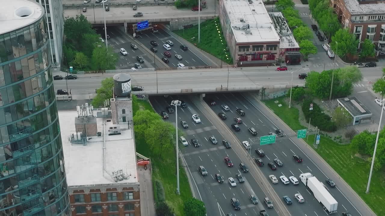 Aerial view of Chicago showing traffic on highways and city buildings