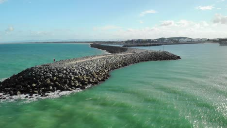 aerial view over the mackay harbor, on the coast of australia - rising, drone shot