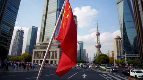 china flag in shanghai cityscape