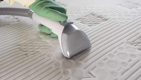 cleaning a mattress with a vacuum