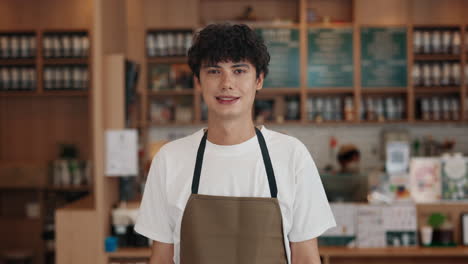 portrait of a barista in a coffee shop