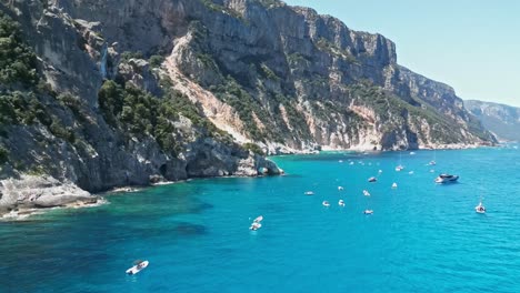 cala goloritze and boat tourism at orosei gulf, sardinia