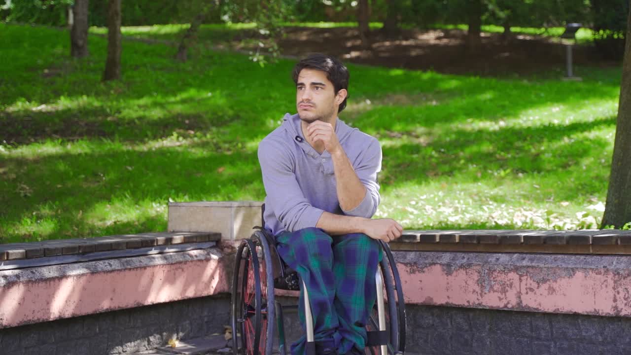 Very thoughtful disabled individual in slow motion.