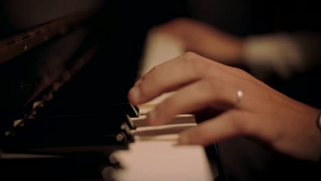 pianist plays romantic melody on vintage piano