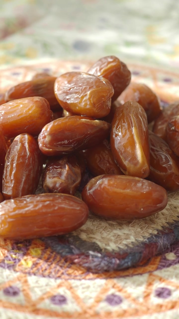 Pile of Sweet Dried Dates on a Decorative Plate
