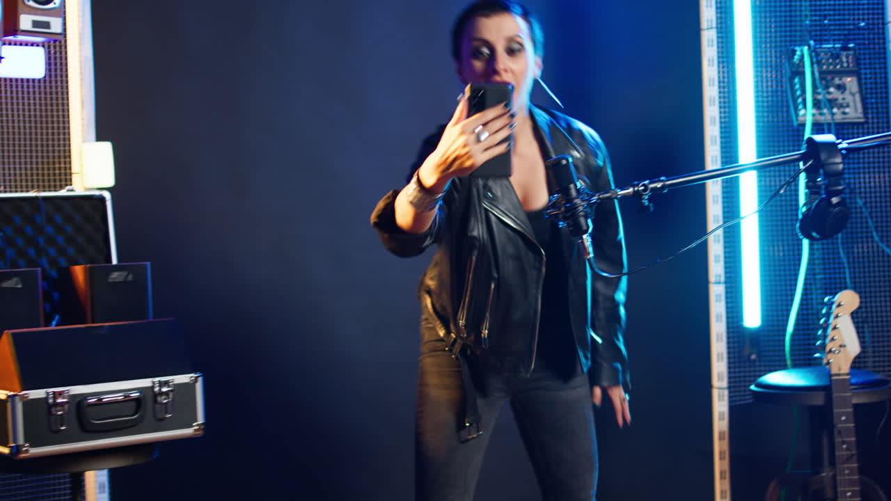 Photos of a woman taking a selfie in a recording studio