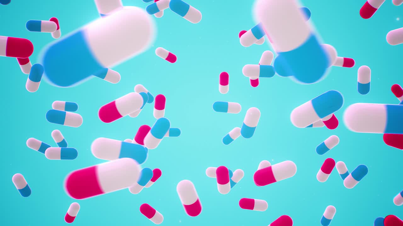 시안 배경에 회전하는 분홍색과 파란색 3d 알약