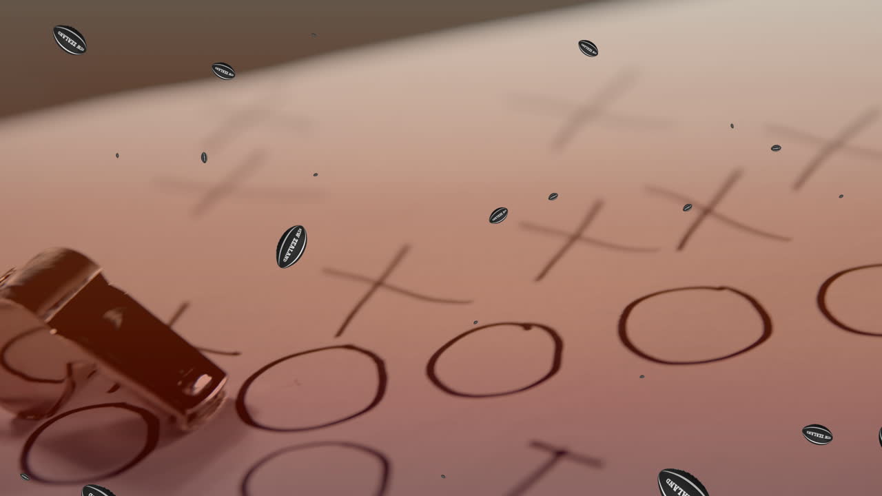 Animation of rugby balls with new zealand text over game plan