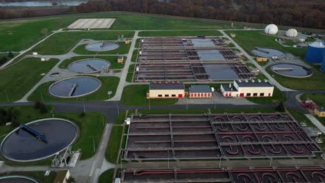 aerial view of wastewater treatment plant at sunset, filtration of dirty or sewage water.