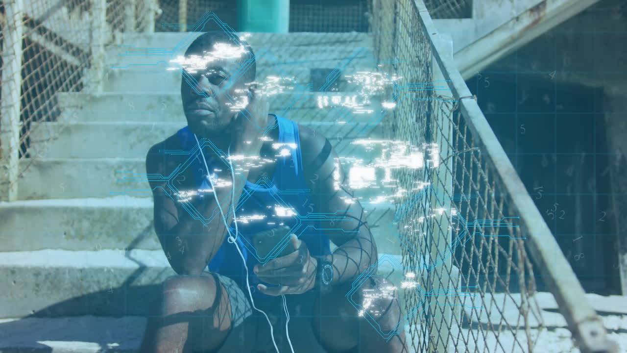 Animation of media icons over african american man wearing earphones outdoors