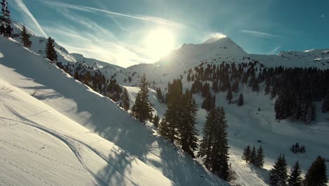 fresh powder snow ski slopes in european alps mountains, beautiful aerial