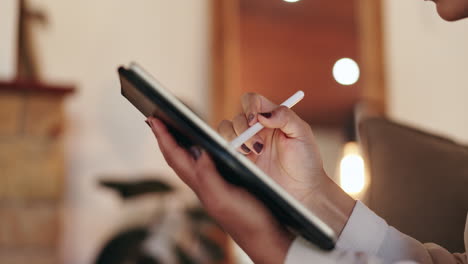 person using a drawing tablet with stylus