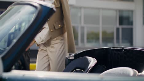couple in a vintage convertible