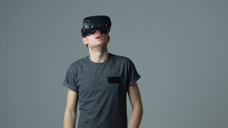 Man-Wearing-Virtual-Reality-Headset-In-Studio-Shot-On-R3D