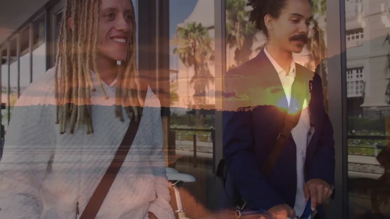 두 명의 미소 짓는 남자들이 자전거로 도시를  ⁇ 고 있는 풍경의 애니메이션