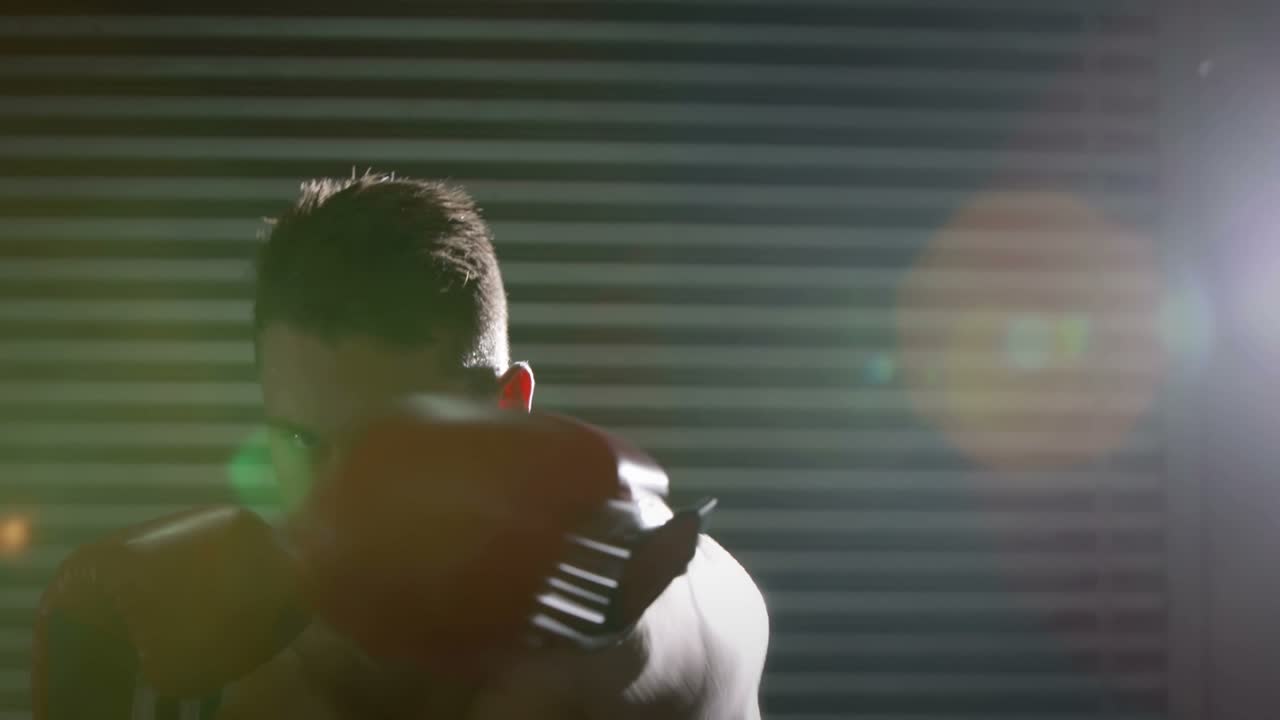 Boxer boxing, red gloves while HUD red globe overlaying him, timeline updating, tracking progress