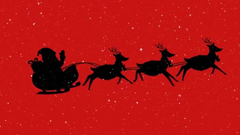 Snow-falling-over-silhouette-of-santa-claus-in-sleigh-being-pulled-by-reindeers-on-red-background