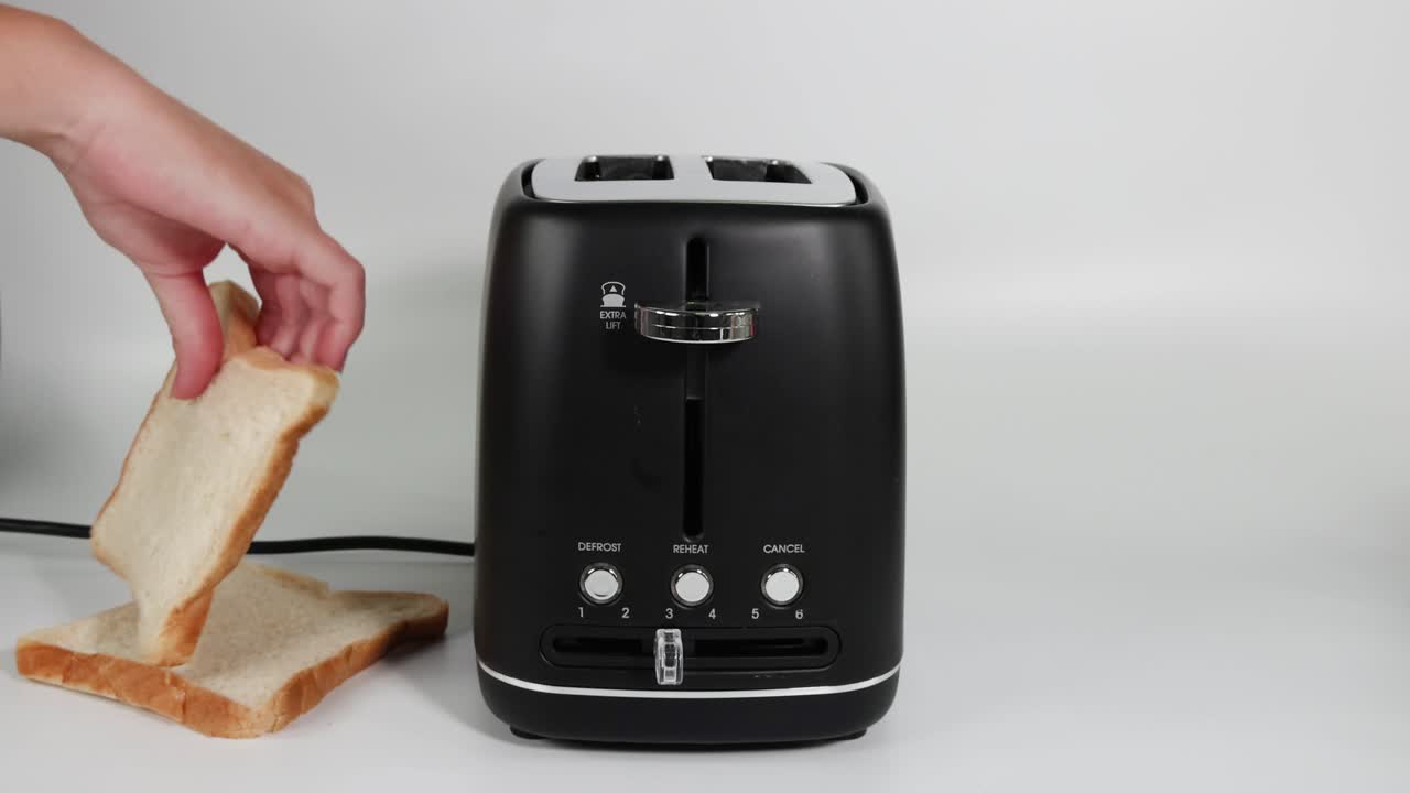 Sequential use of a toaster to make toast and bacon