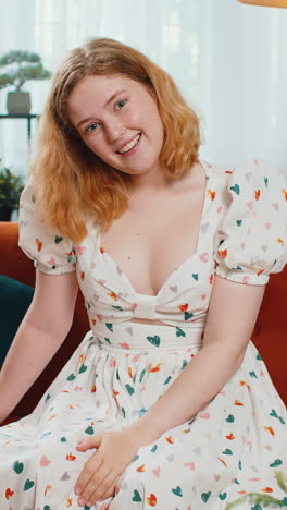 pretty young woman smiling pointing to camera choosing lucky winner indicating inviting approve