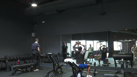 modern gym interior with people working out