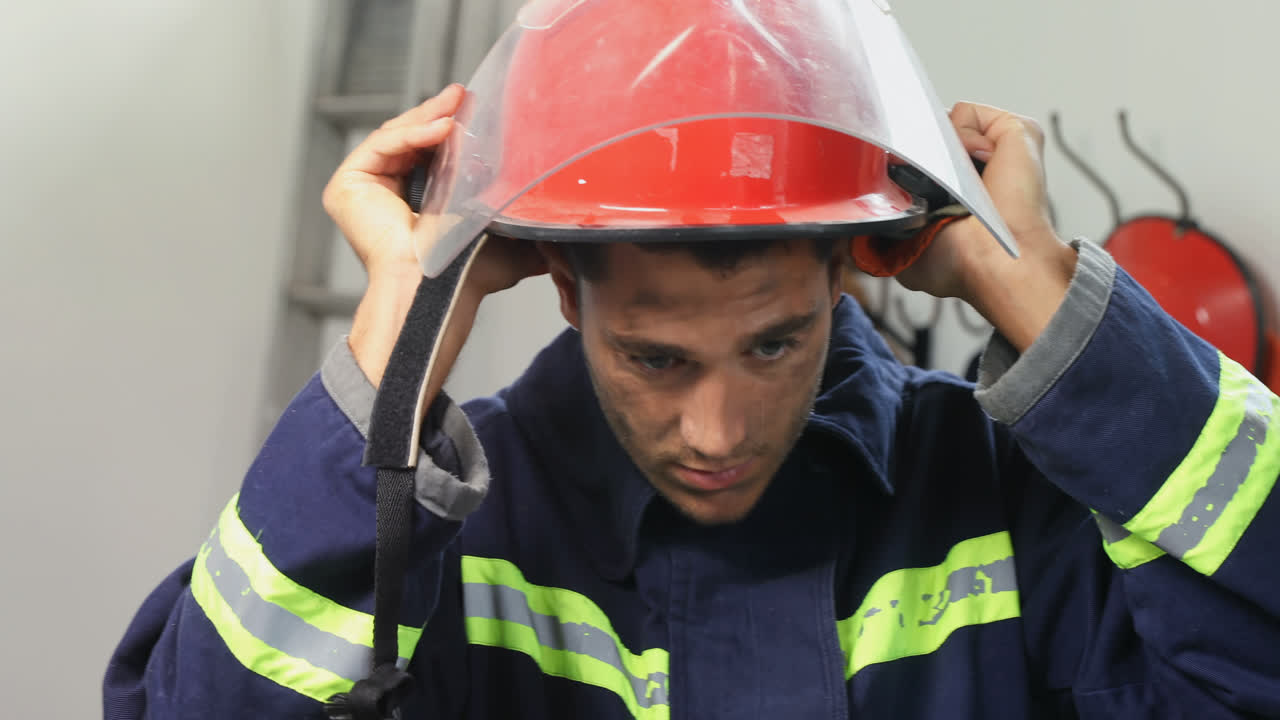Exhausted fireman standing in the office 4K 4k