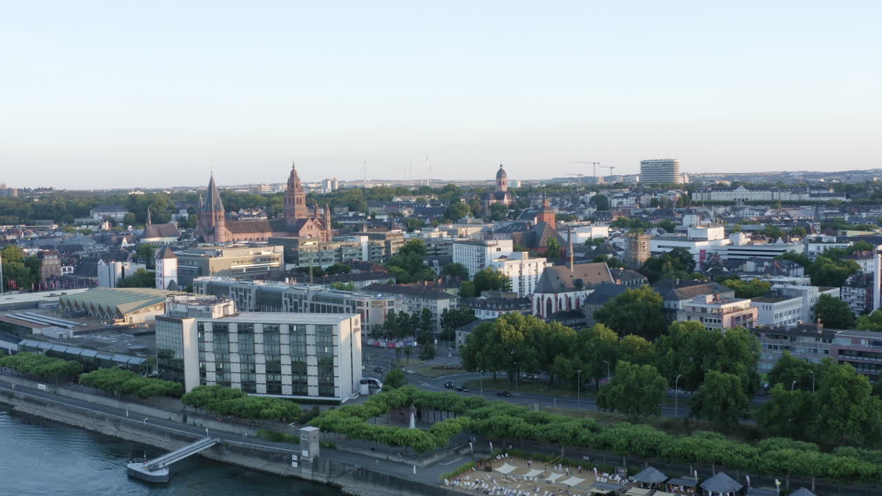 Aerial circling drone View of Mainz dom, city hall river rhine and Cityscape at Sunset Germany 4k