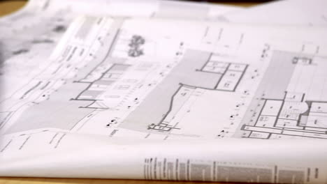 Blueprints on architects desk