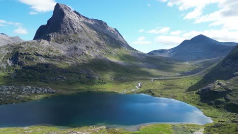 Mountain-Lake-in-Reinheimen-National-Park,-Trollstigen,-Norway---Aerial-Circling