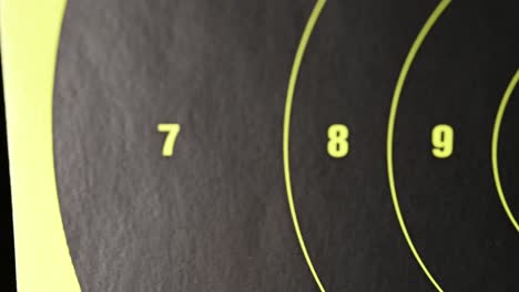 slow left to right slide over a high visibility modern gun target numbers