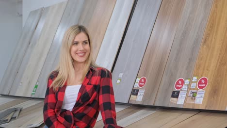 woman choosing laminate flooring