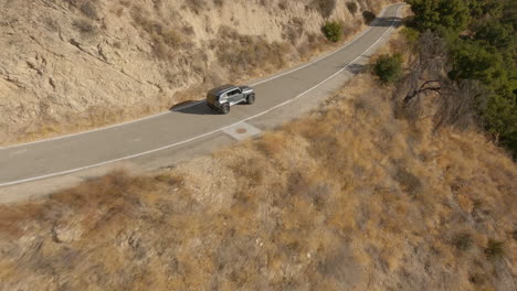 Fast-FPV-diving-shot-alongside-a-new-police-car