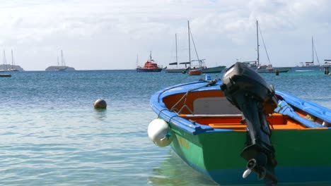 a small fishing vessel on a buoy on a cloudy day