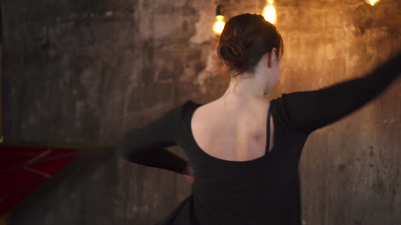 Graceful Dancer in Black Dress