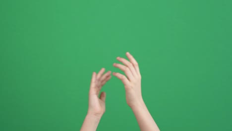 applause. kid clapping hands, applauding on green screen chroma key background. 4k video