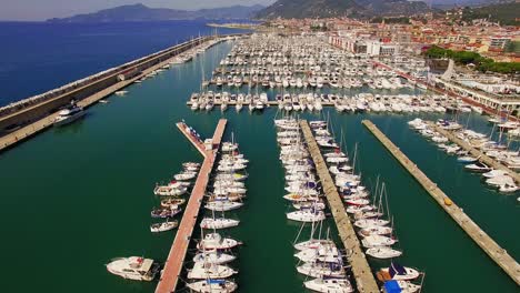 aerial of boats moored at harbor