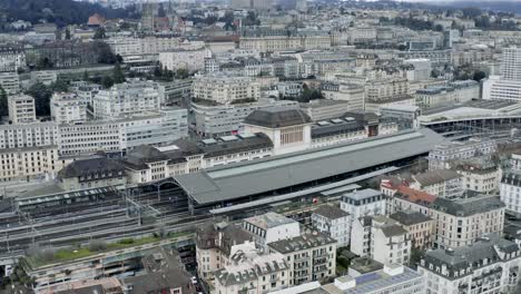 Drone-Aerial-of-the-beautiful-swiss-city-center-of-lausanne-located-on-the-lake-geneva-in-Switzerland-during-winter,-Europe