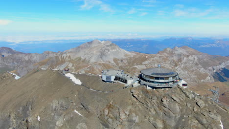 flying-Schilthorn-piz-Gloria:-circling-over-the-station-and-overlooking-spectacular-mountains-and-a-Swiss-autumn-landscape