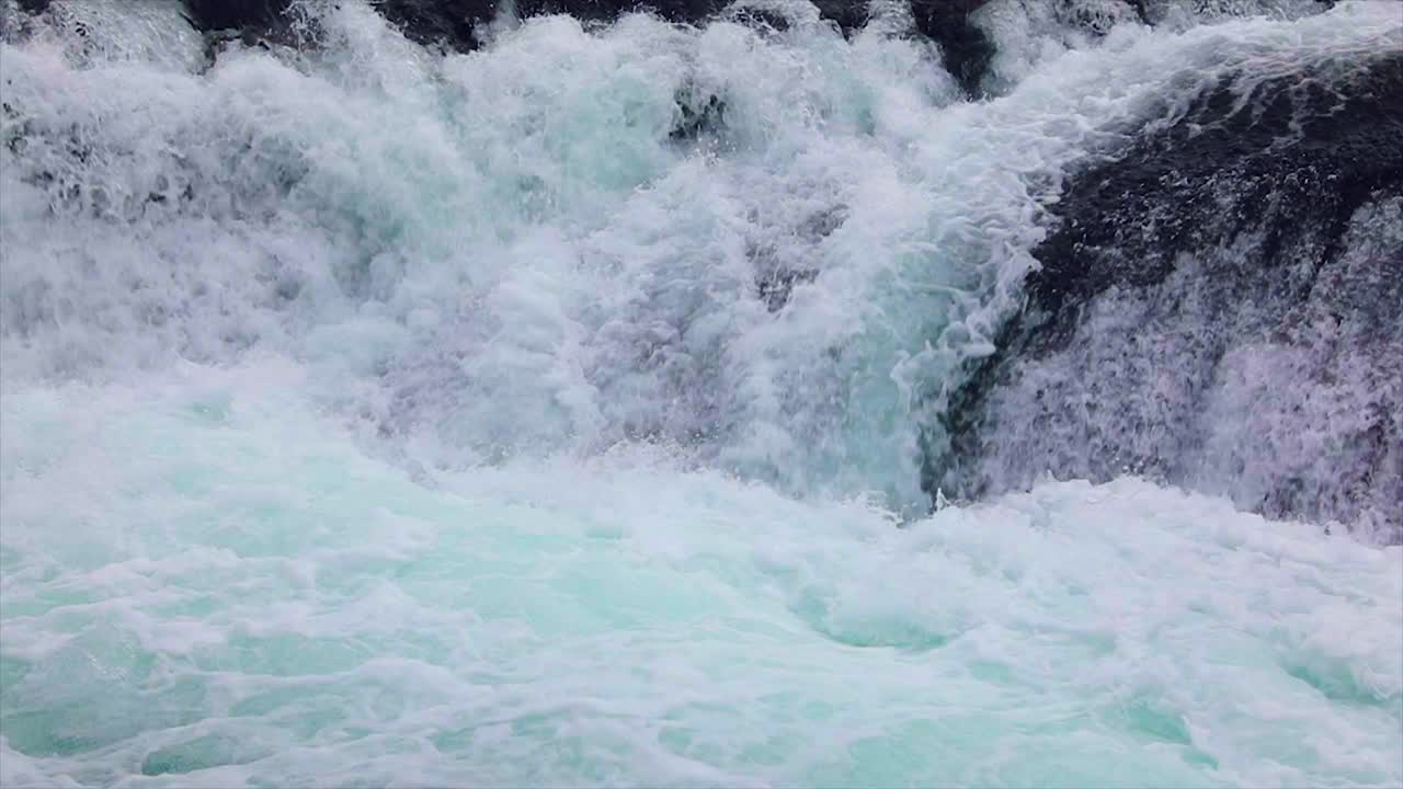 Mountain river water with slow motion closeup